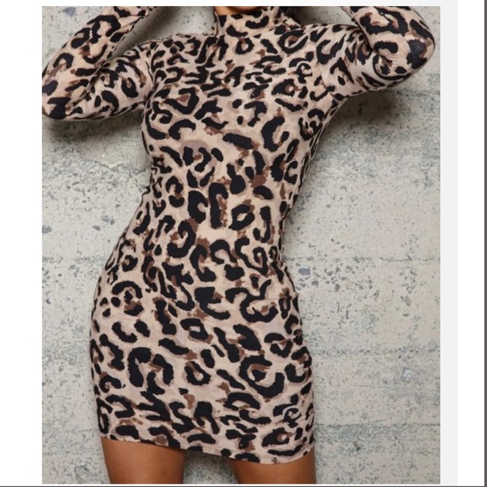 New Animal Printed Body Con Mini Dress.

95% Polyester 5% spandex